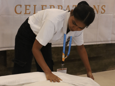 Bed-making and room presentation activities.